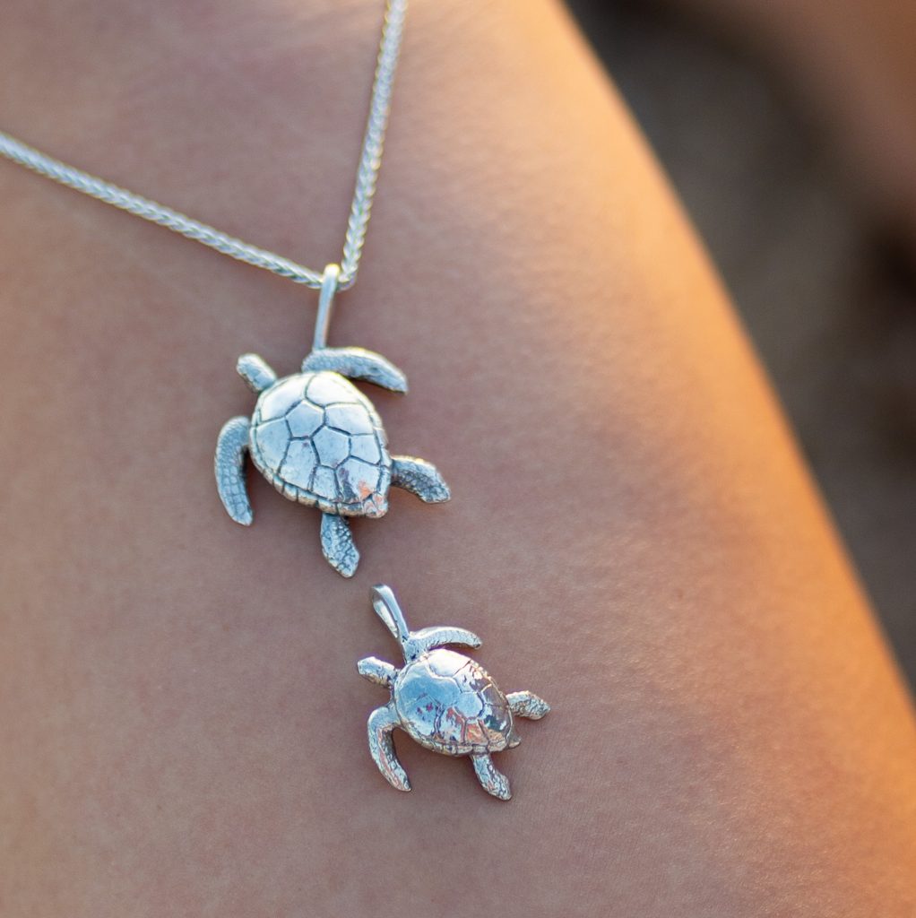 Turtle pendants cast in sterling silver